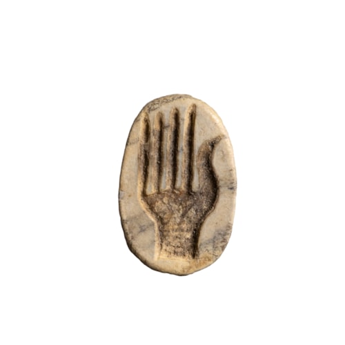 A New-Kingdom steatite glazed scarab. Hand.